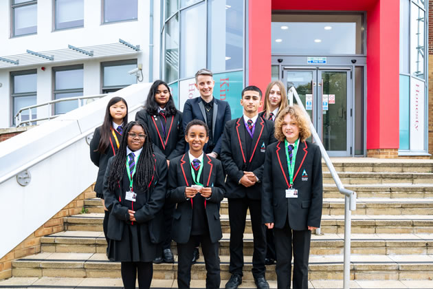 School principal Ms Donarchy with students