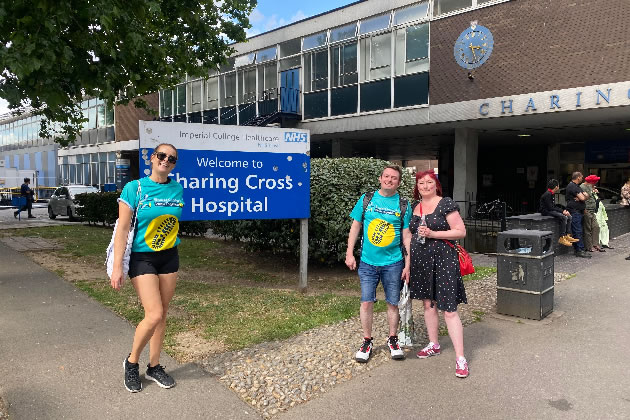 Gary (centre) outside Charing Cross hospital
