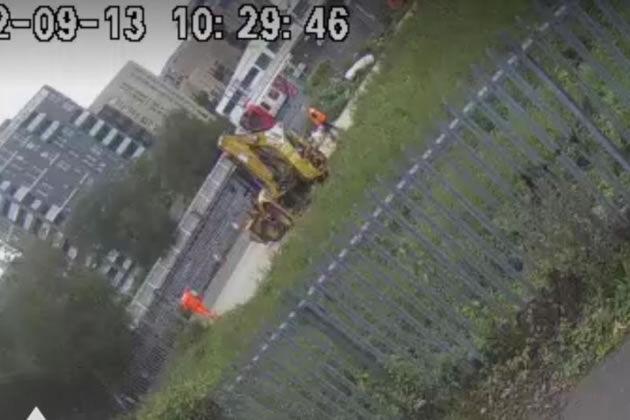 Contractors start digging holes where the car park is planned