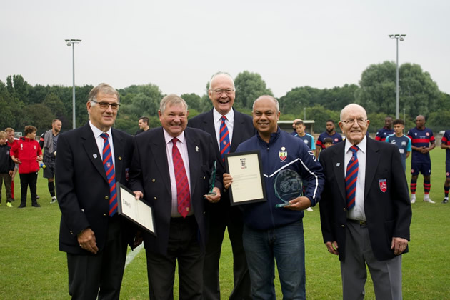Sanjeev Sharma (second from right) with league officials