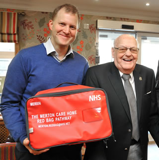 Chair Dr Andrew Murray and resident John Sprakes at red bag launch
